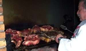 Demetrio Terradillos grilling chuletas (Photo by Sofia Perez)