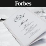 Closeup of restaurant menu and cutlery